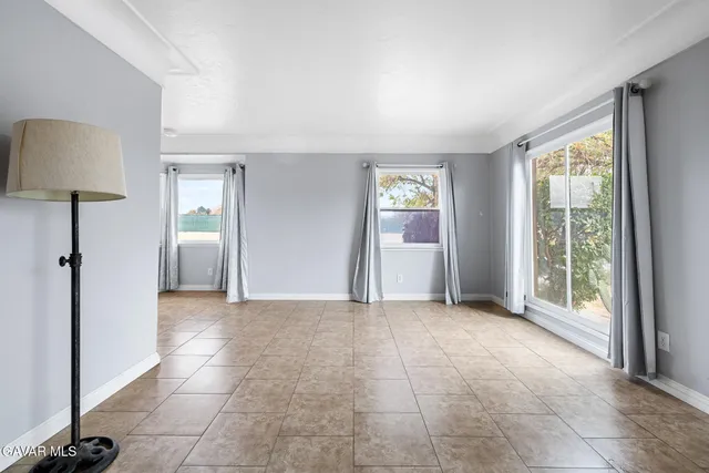 a view of a livingroom with a staircase