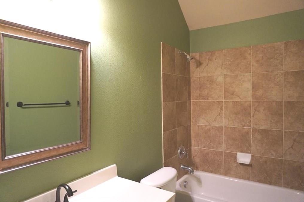935 Panther Lane Allen, TX 75013 - Photo 12 of 20 a bathroom with a sink and a mirror