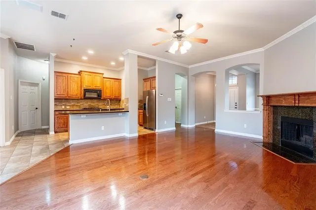 a view of a kitchen with a stove cabinets and a kitchen