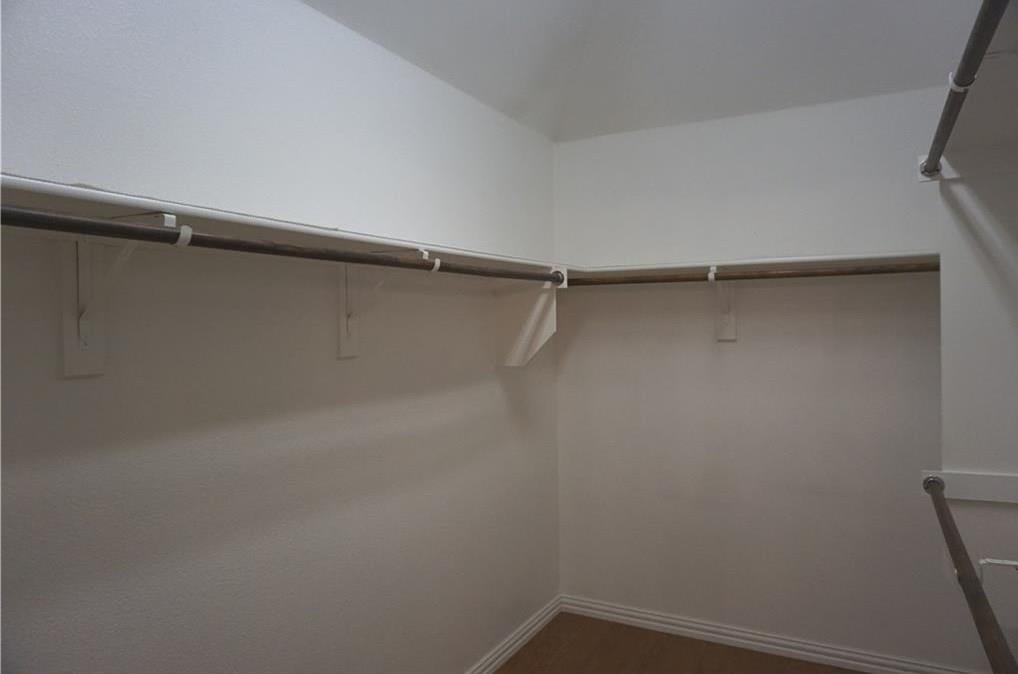 935 Panther Lane Allen, TX 75013 - Photo 15 of 20 a view of a room with shelf on the wall