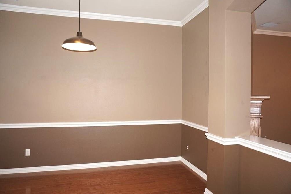 935 Panther Lane Allen, TX 75013 - Photo 4 of 20 a view of a small space with racks on the wall