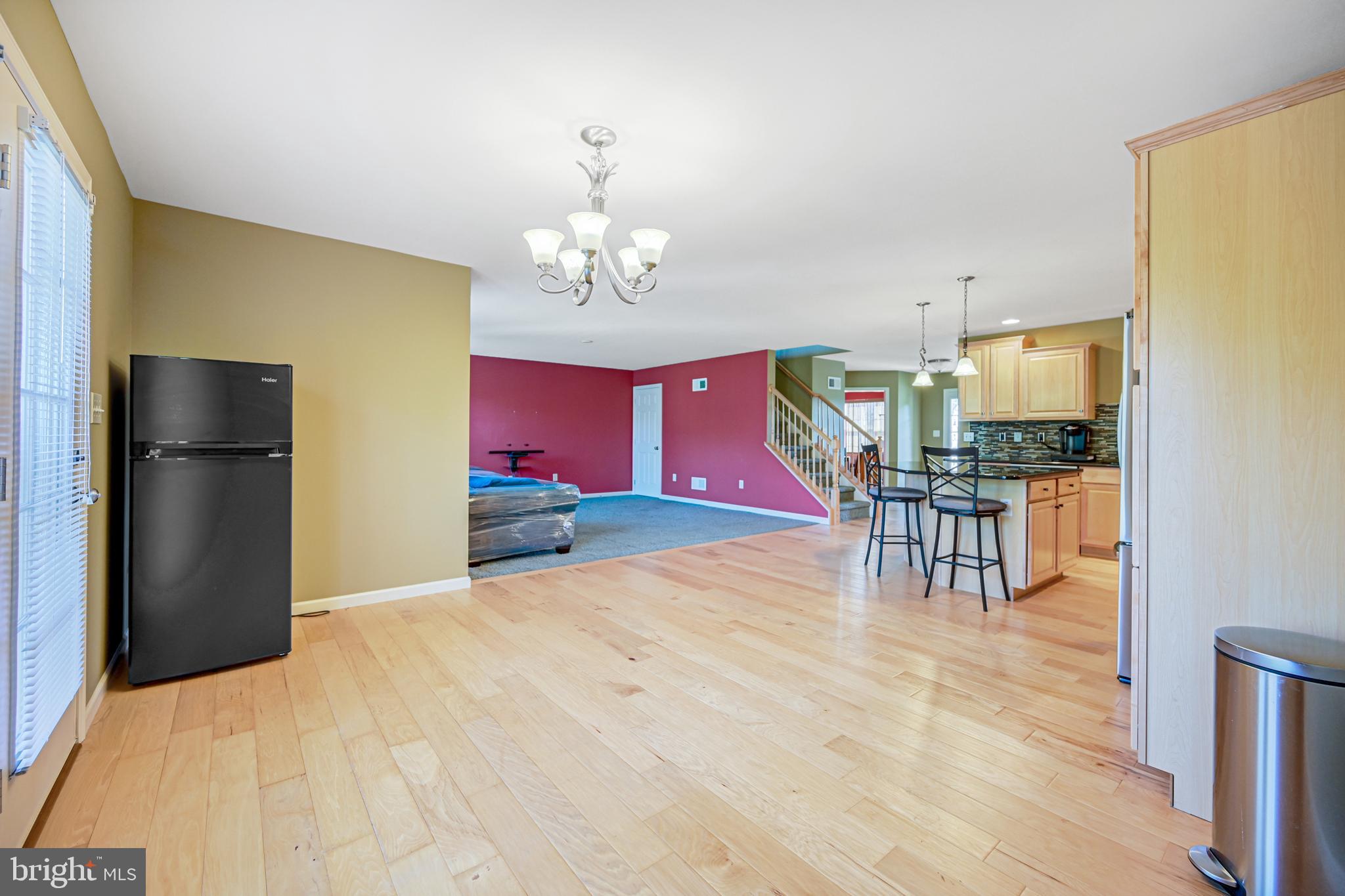 3265 Lewisberry Road York, PA 17404 - Photo 10 of 34 a view of a dining room with furniture and a chandelier