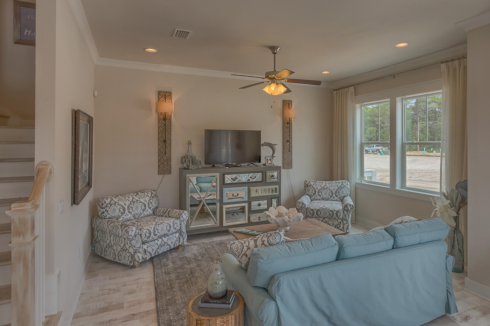 336 Milestone Dr Inlet Beach, Unit 534B Inlet Beach, FL 32461 - Photo 9 of 50 a living room with furniture and a flat screen tv