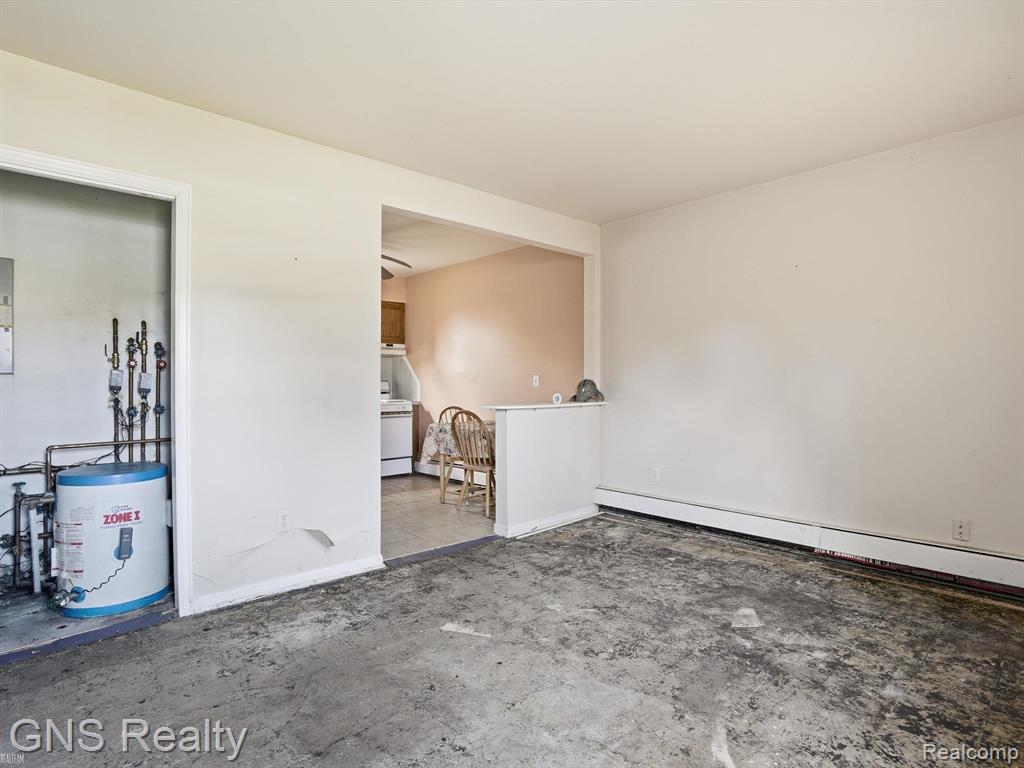 2717 Normandy Road Royal Oak, MI 48073 - Photo 7 of 13 Open-concept living area with a partial wall defining the space