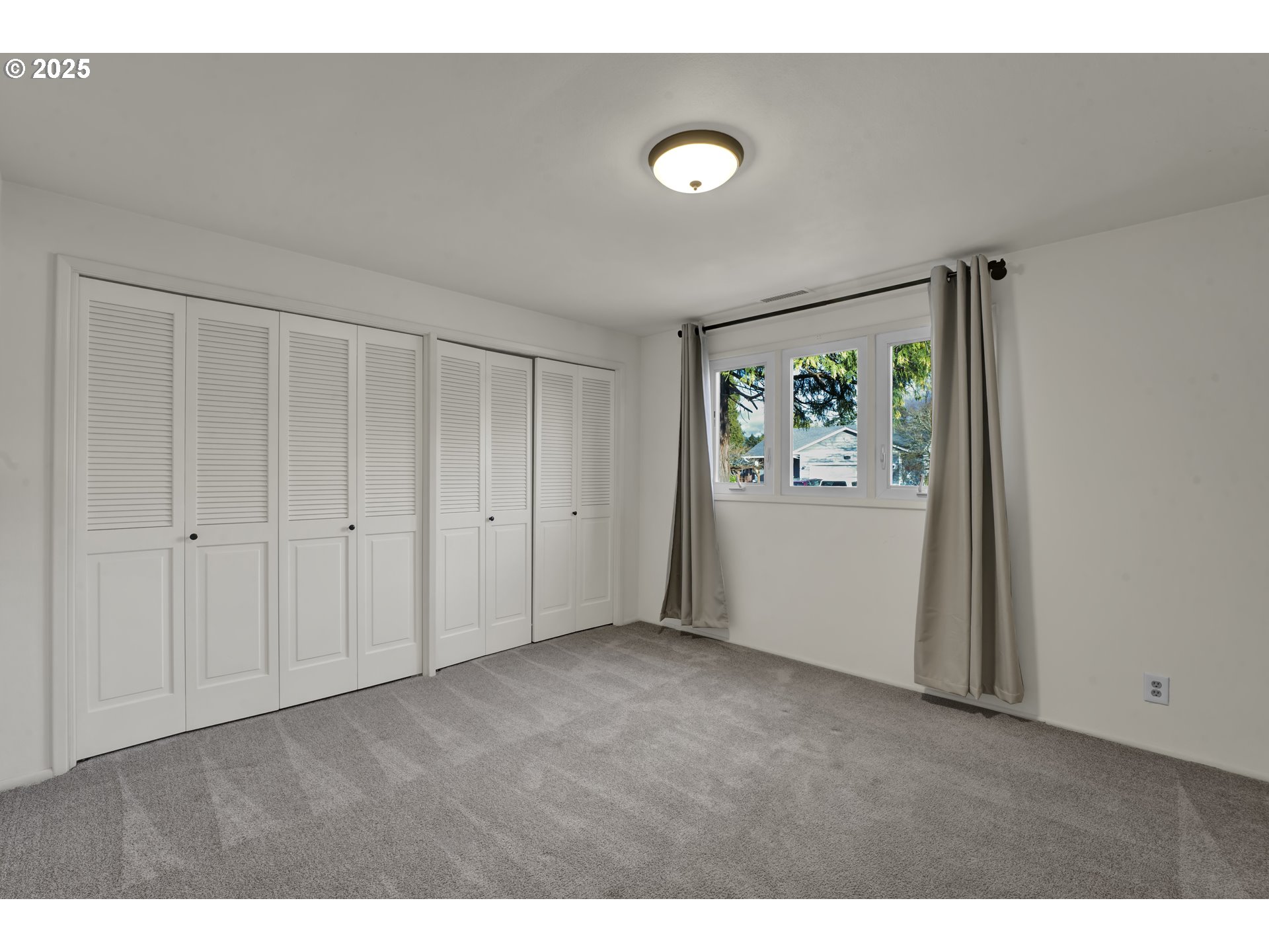 2140 Tabor Street Eugene, OR 97401 - Photo 16 of 26 a view of an empty room with a window