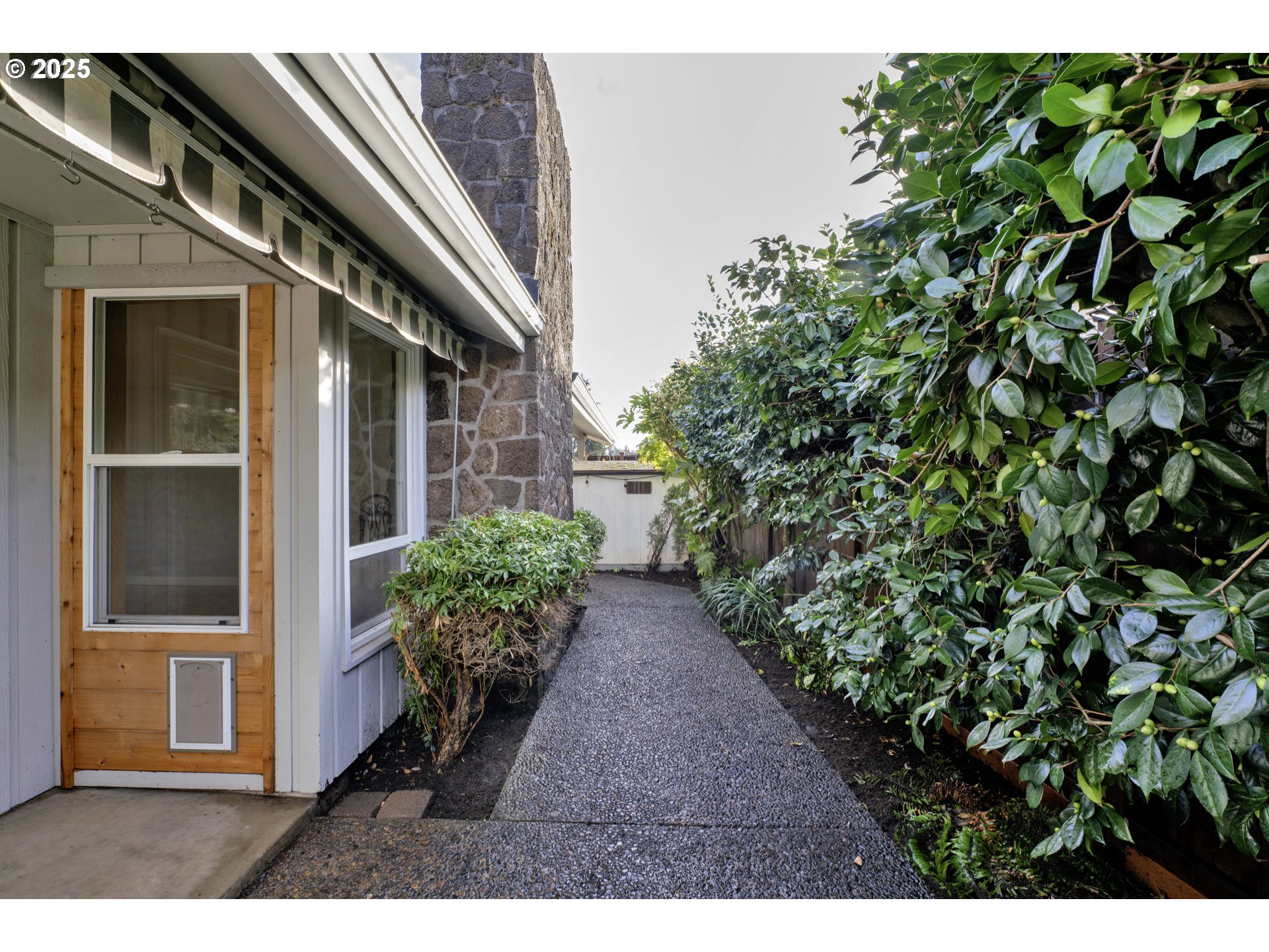 2140 Tabor Street Eugene, OR 97401 - Photo 23 of 26 a view of a pathway both side of house