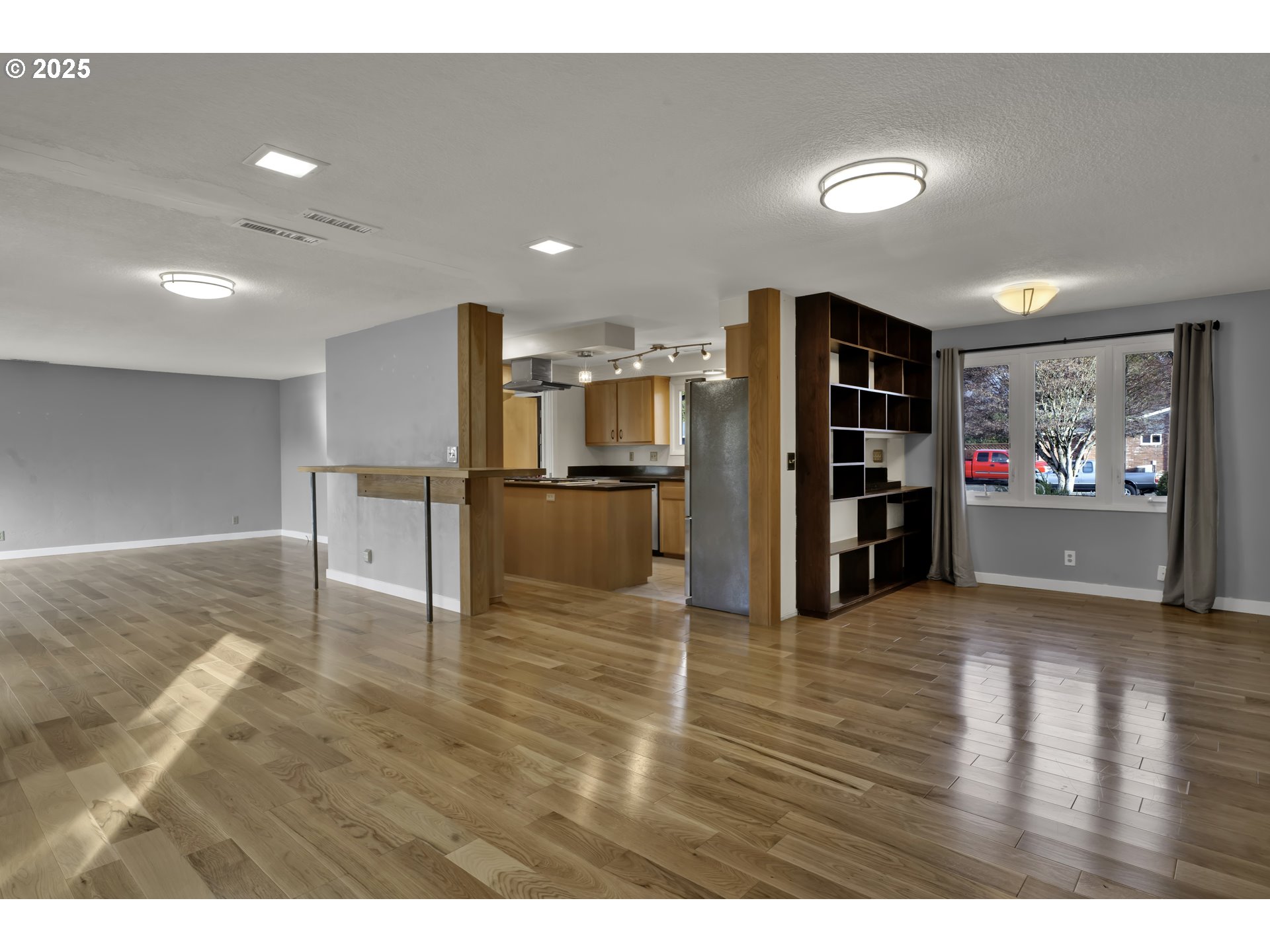 2140 Tabor Street Eugene, OR 97401 - Photo 8 of 26 a view of a kitchen with a refrigerator and a sink