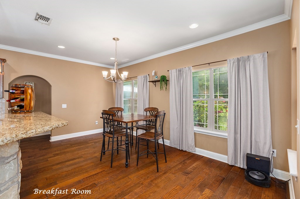 1171 Old Ewing Road Lufkin, TX 75901 - Photo 9 of 49 a dining room with furniture window entryway and wooden floor