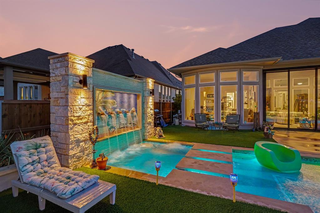 573 Broadleaf Way Haslet, TX 76052 - Photo 35 of 35 a view of swimming pool with lawn chairs and a yard