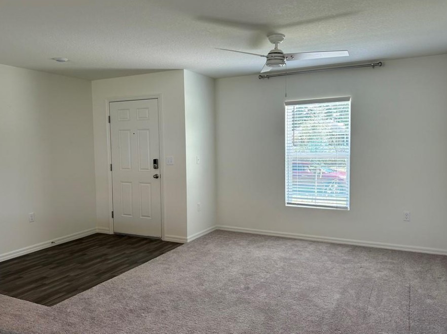 1352 Clearmont Street Sebastian, FL 32958 - Photo 3 of 9 an empty room with windows