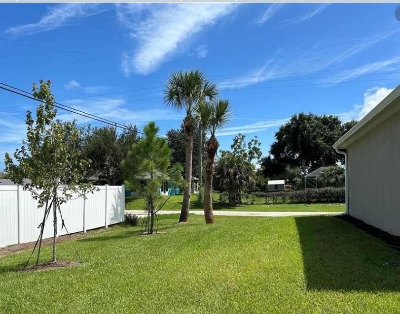 1352 Clearmont Street Sebastian, FL 32958 - Photo 7 of 9 a view of a park with a large tree