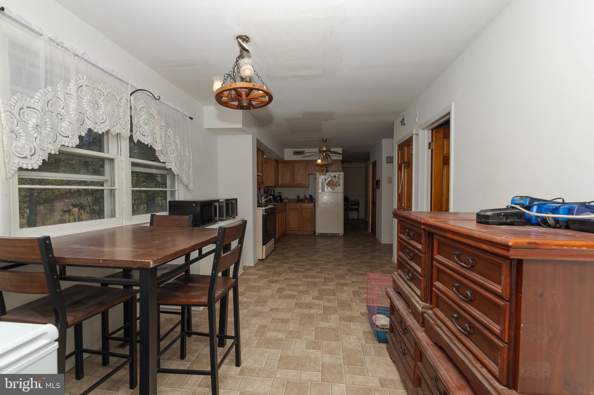 30 Timberline Drive Newark, DE 19711 - Photo 14 of 39 a view of a dining room with furniture and window