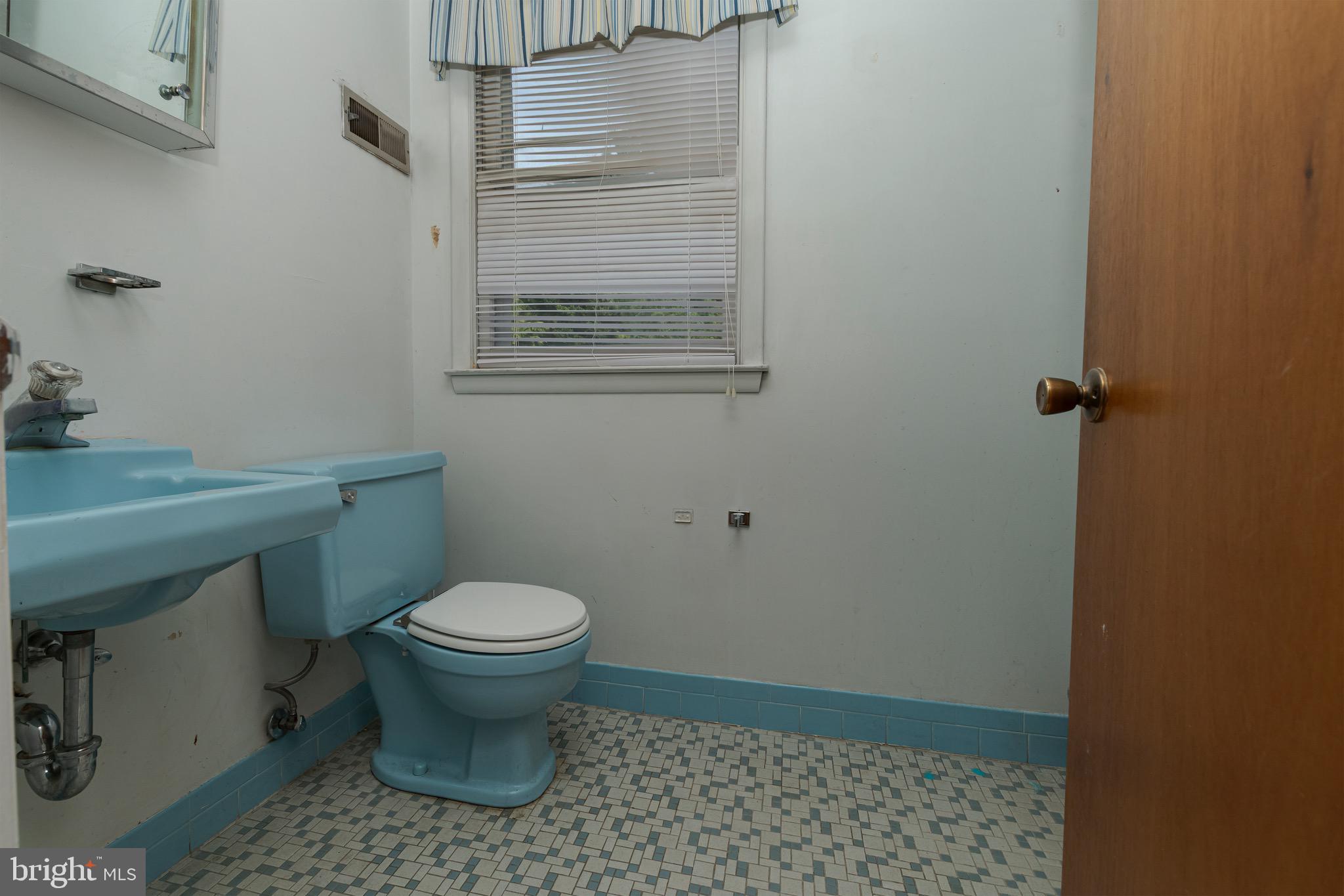30 Timberline Drive Newark, DE 19711 - Photo 22 of 39 a bathroom with a toilet and a sink