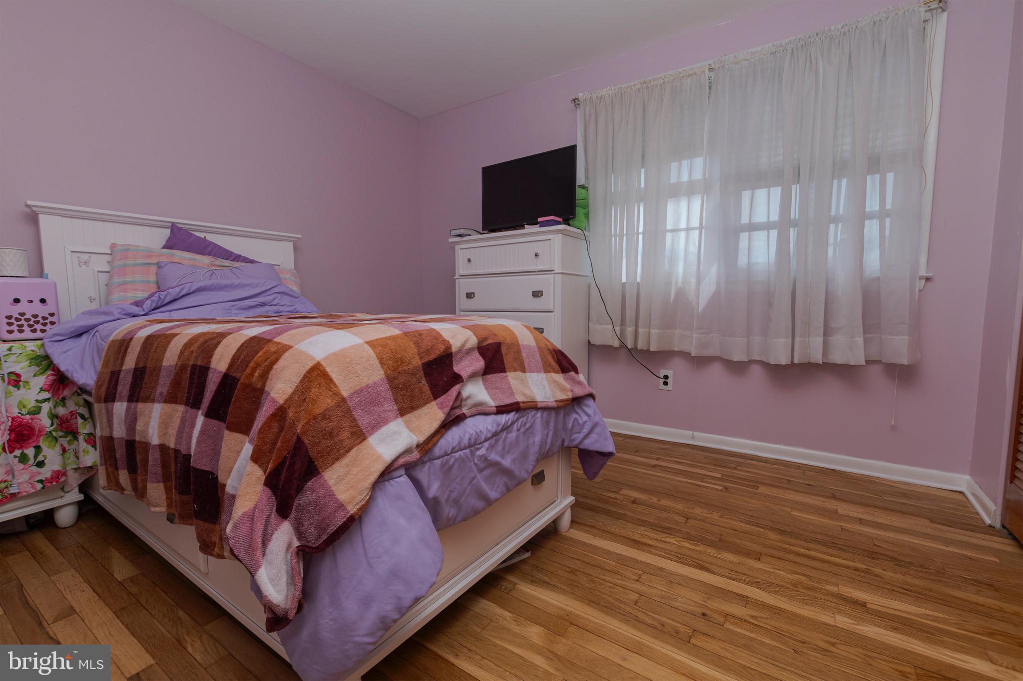 30 Timberline Drive Newark, DE 19711 - Photo 25 of 39 a bedroom with a bed and flat screen tv