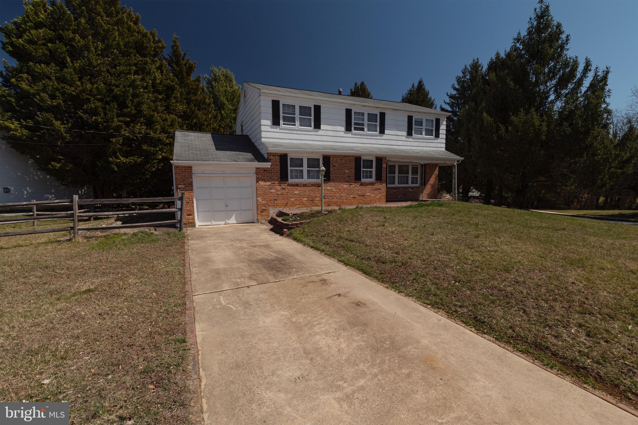 30 Timberline Drive Newark, DE 19711 - Photo 3 of 39 a front view of a house with a yard