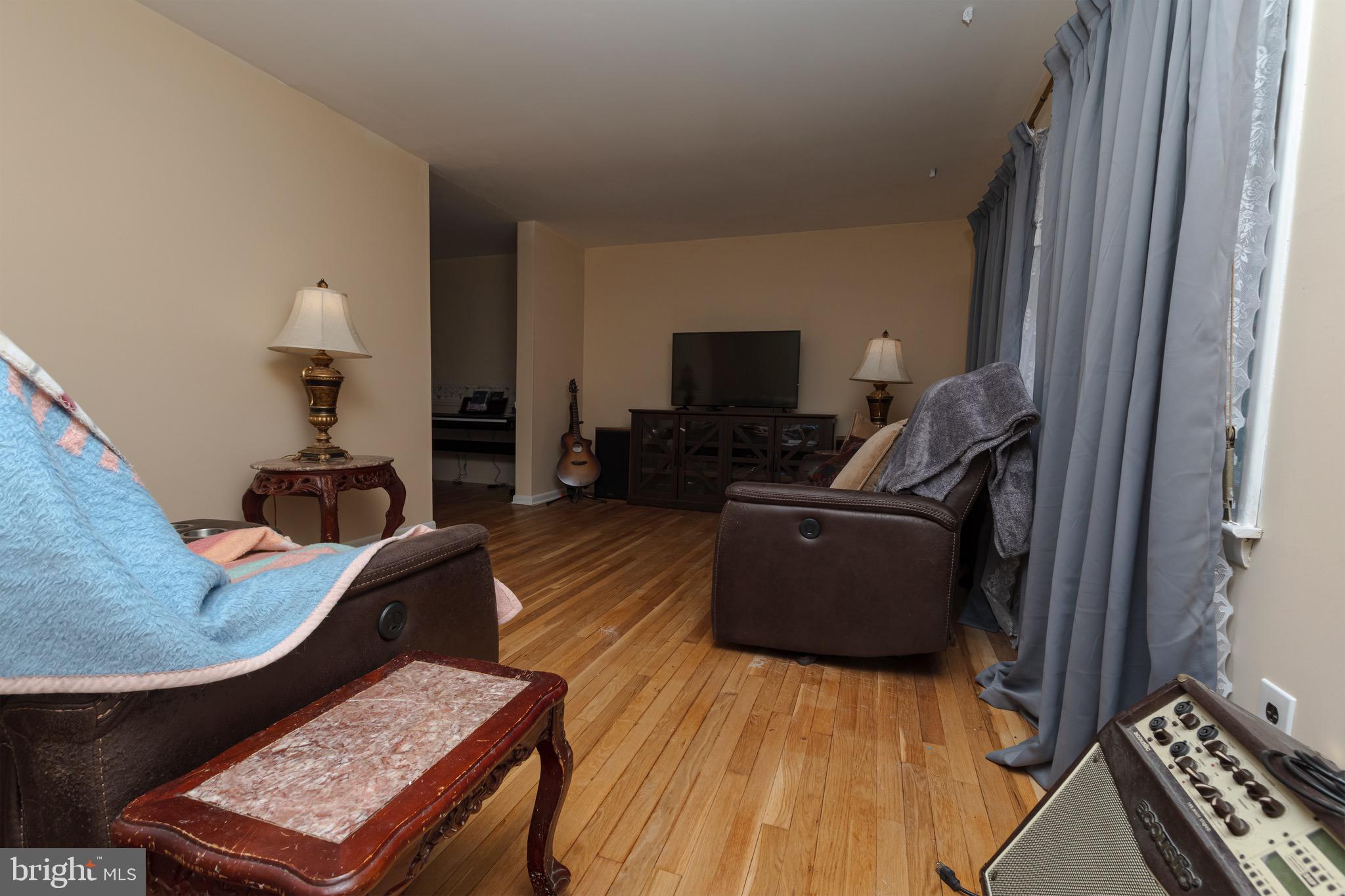 30 Timberline Drive Newark, DE 19711 - Photo 7 of 39 a living room with furniture and a flat screen tv
