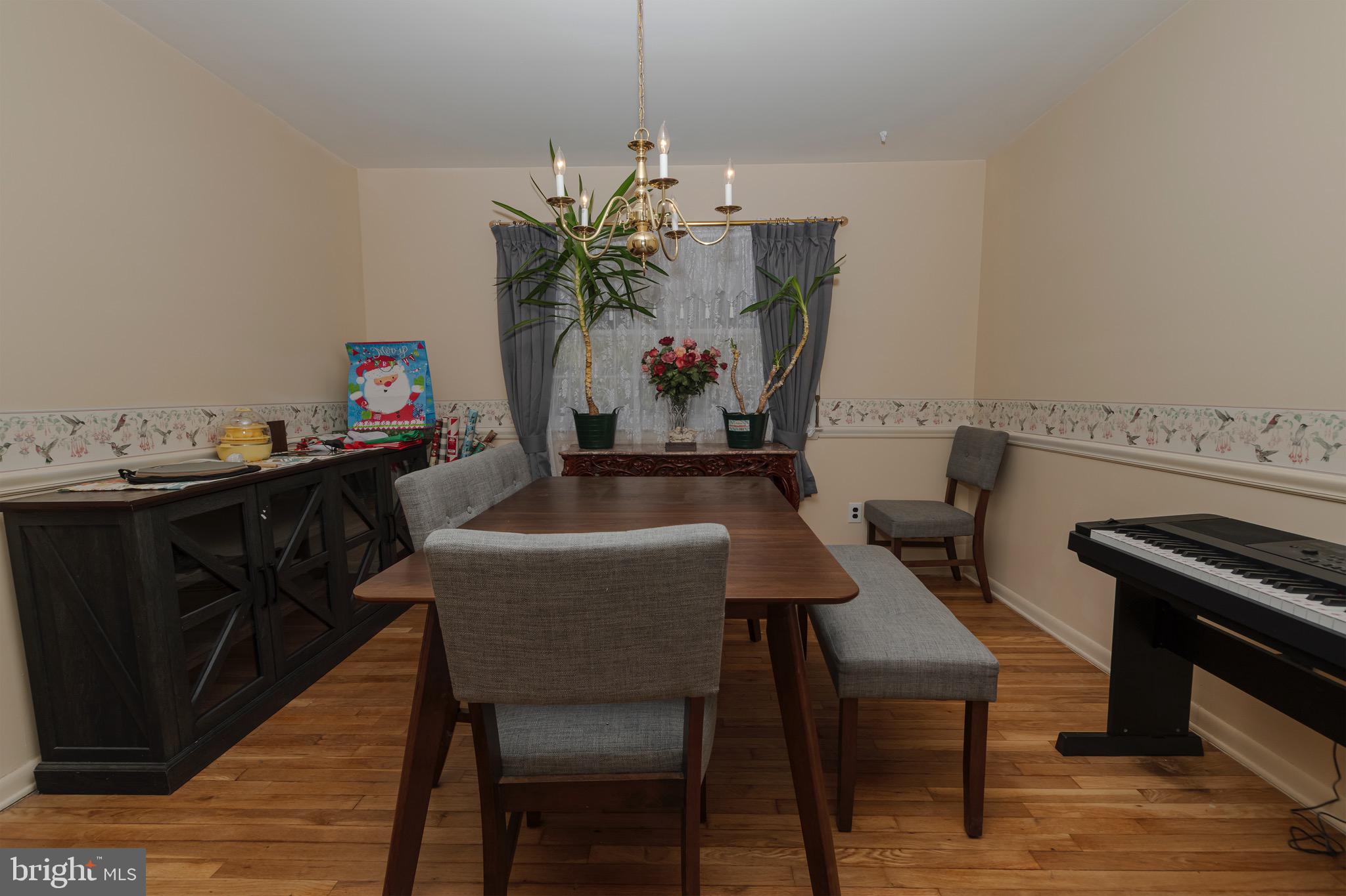 30 Timberline Drive Newark, DE 19711 - Photo 9 of 39 a dining room with furniture and wooden floor
