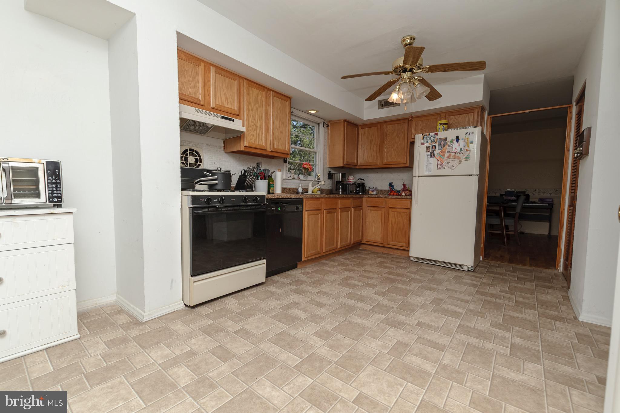 30 Timberline Drive Newark, DE 19711 - Photo 10 of 39 a view of a kitchen with a sink and a stove top oven
