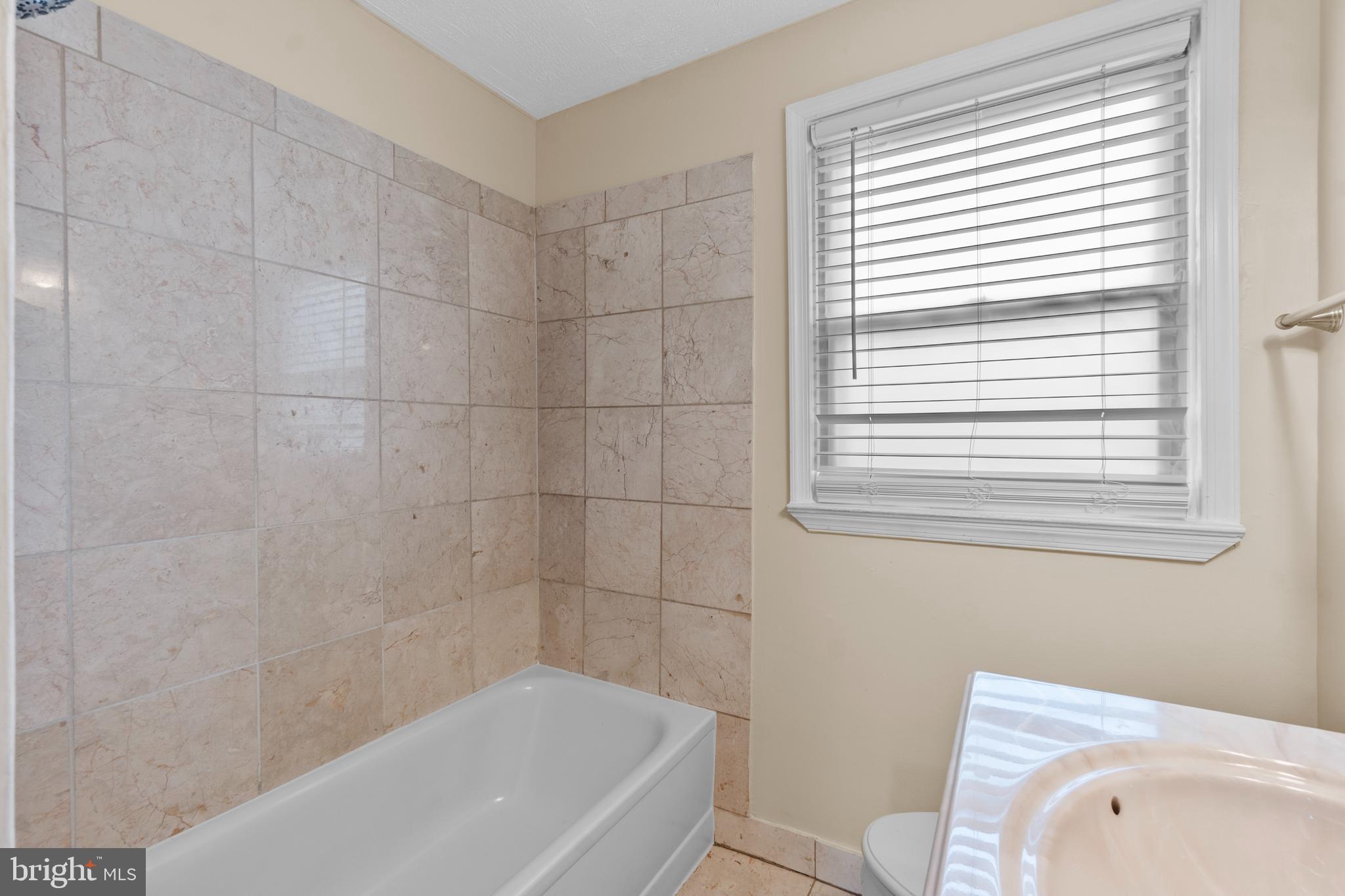 5472 Bucknell Road Baltimore, MD 21206 - Photo 16 of 34 Bathroom One
