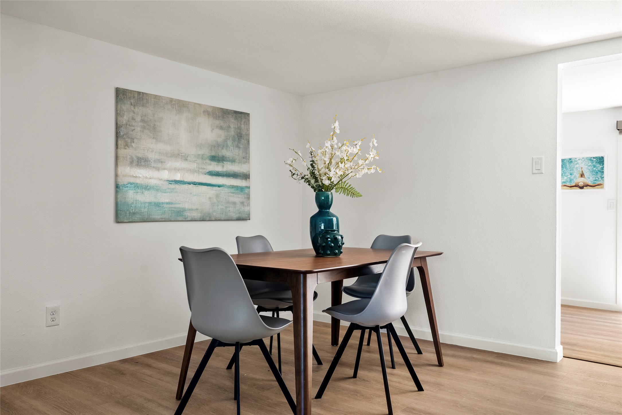 507 West Dittmar Road Austin, TX 78745 - Photo 17 of 40 a view of a dining room with furniture and wooden floor