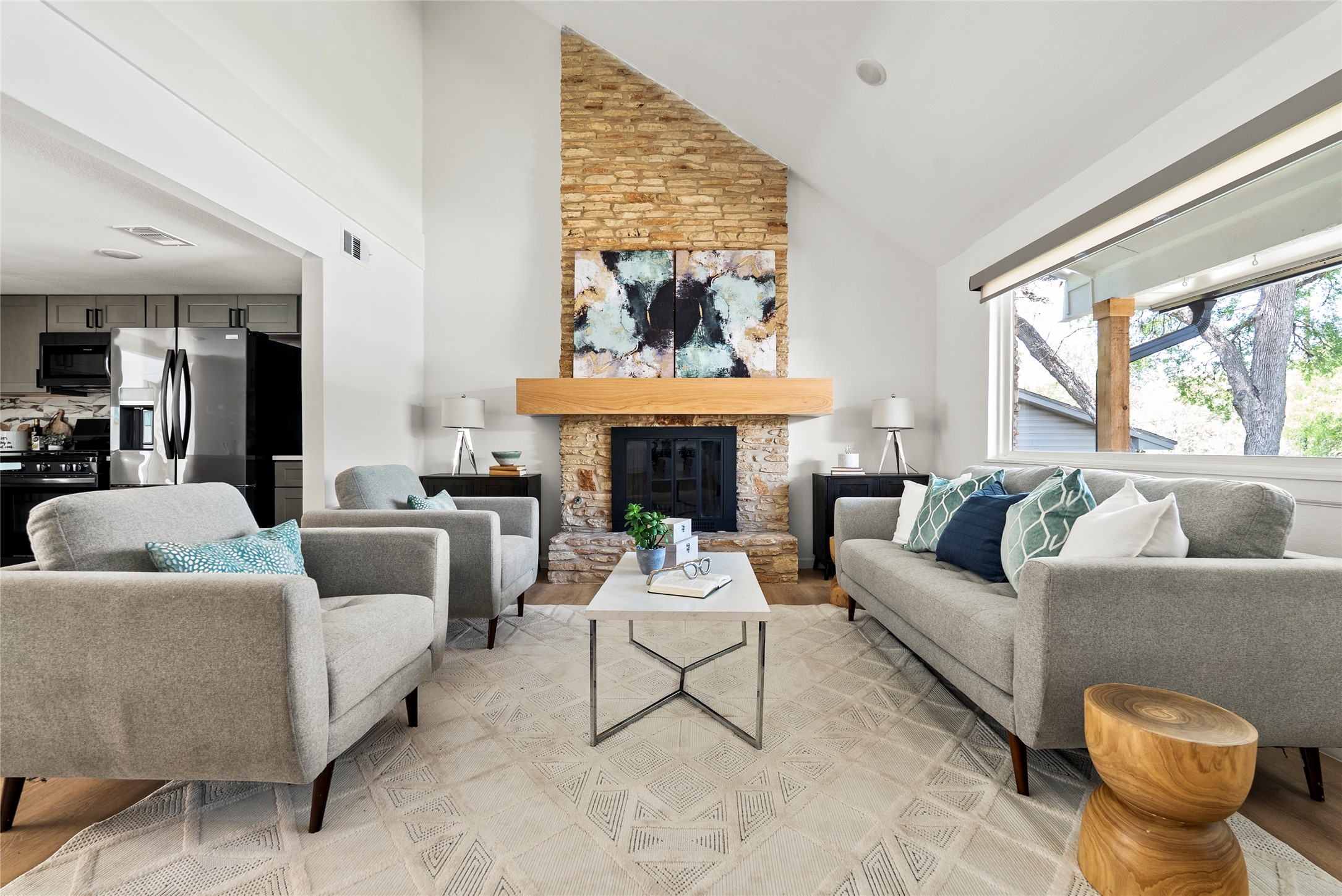 507 West Dittmar Road Austin, TX 78745 - Photo 19 of 40 a living room with furniture a fireplace and a large window
