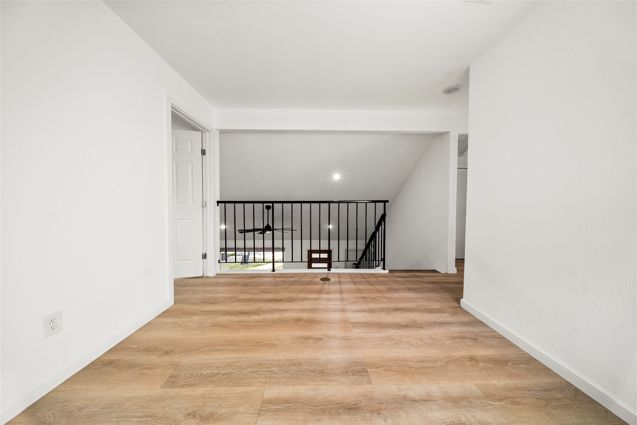 507 West Dittmar Road Austin, TX 78745 - Photo 23 of 40 a view of an empty room with wooden floor