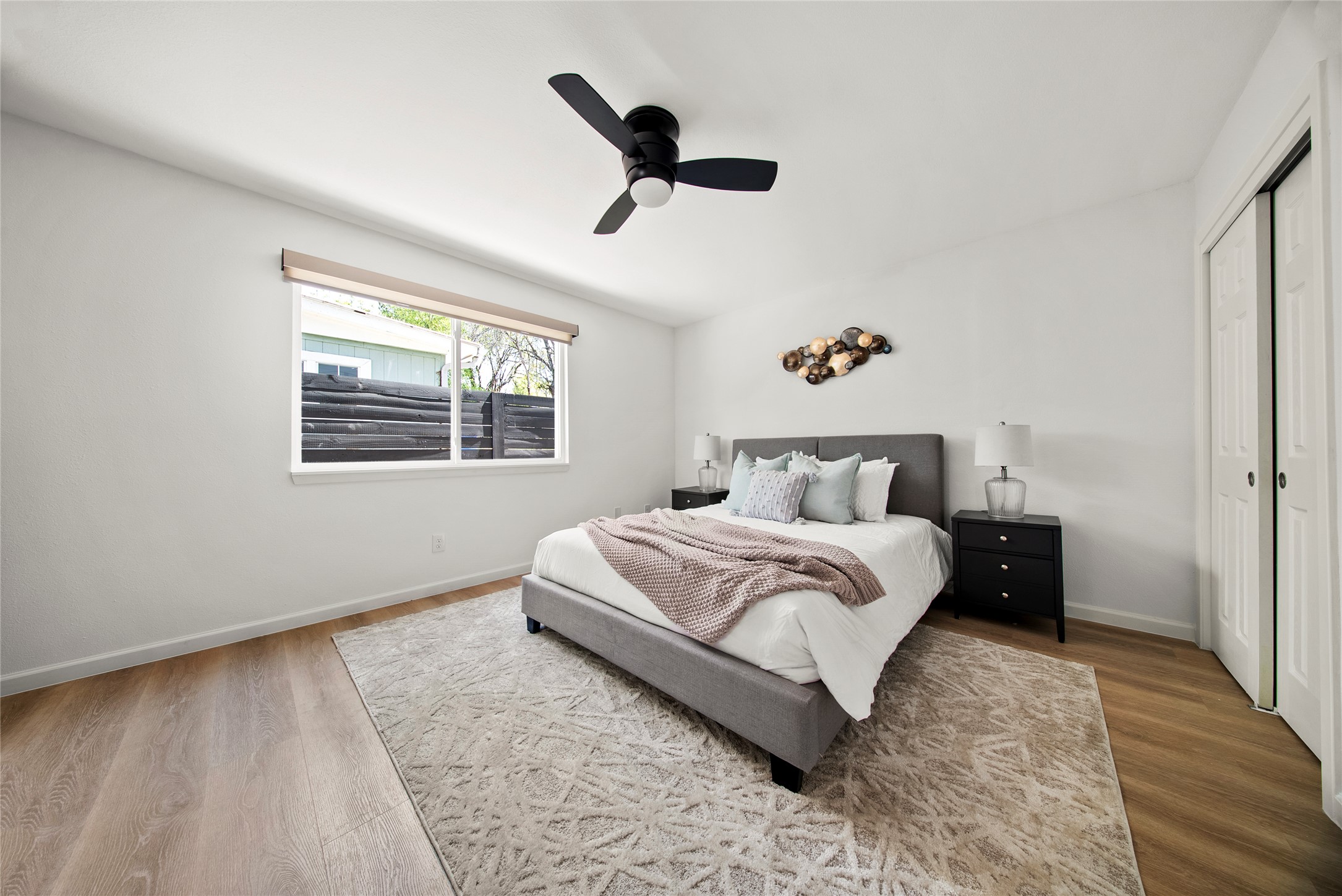 507 West Dittmar Road Austin, TX 78745 - Photo 32 of 40 a bedroom with a bed and a window