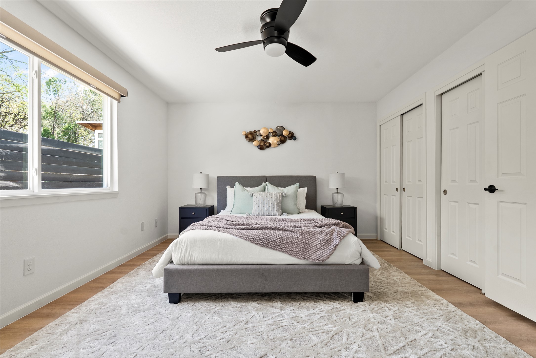 507 West Dittmar Road Austin, TX 78745 - Photo 33 of 40 a spacious bedroom with a bed and window