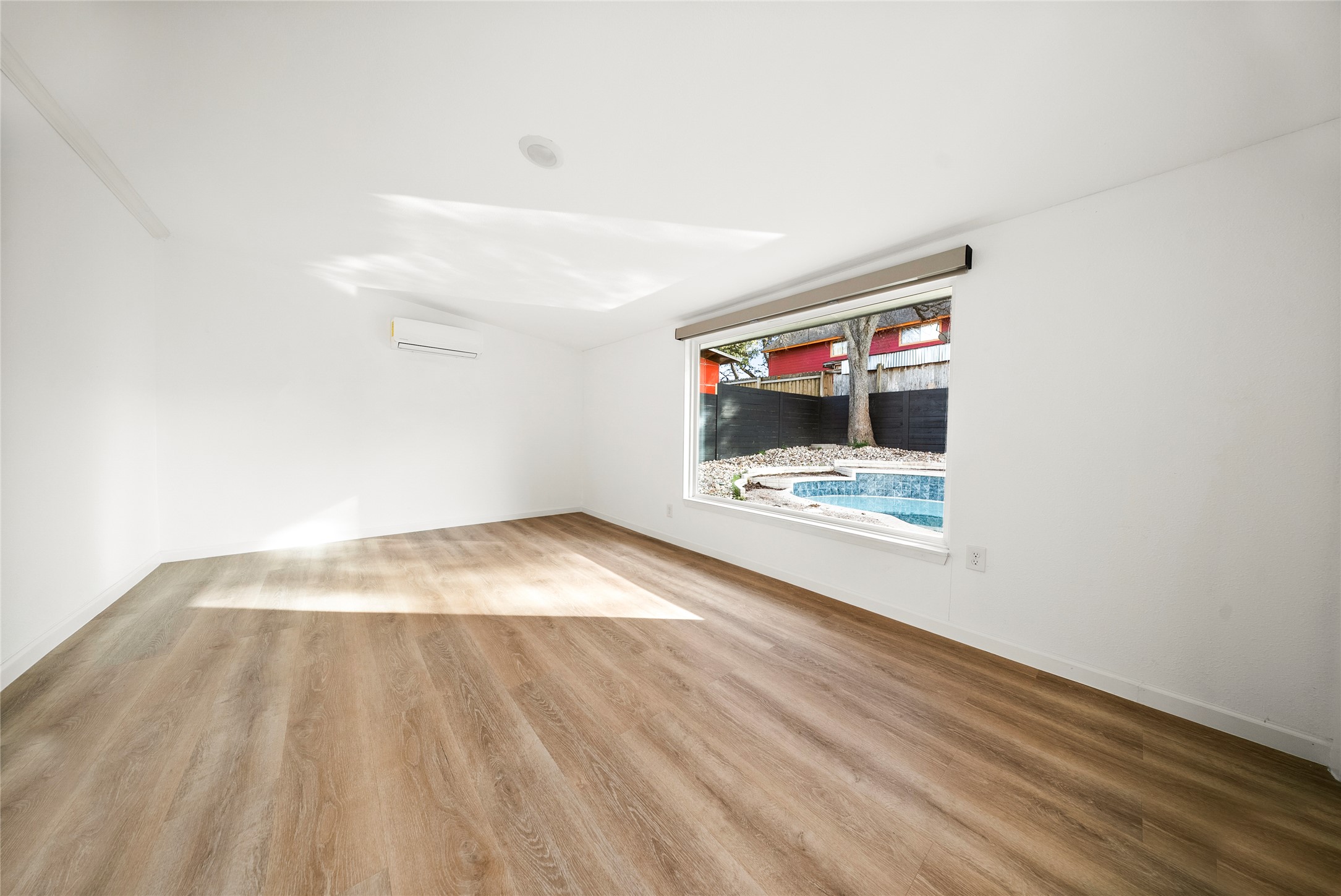 507 West Dittmar Road Austin, TX 78745 - Photo 34 of 40 a view of empty room with wooden floor