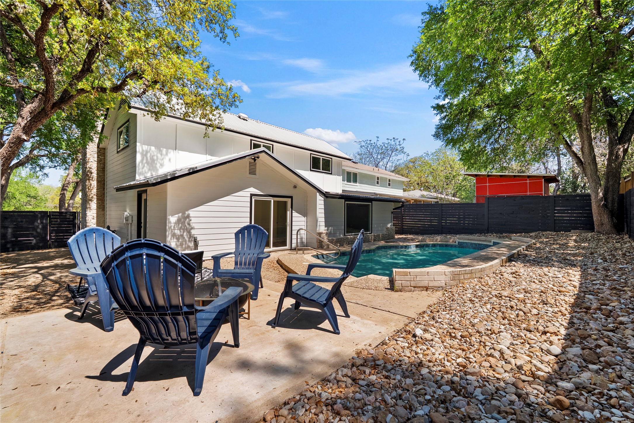507 West Dittmar Road Austin, TX 78745 - Photo 36 of 40 a view of a patio with a table chairs and a fire pit