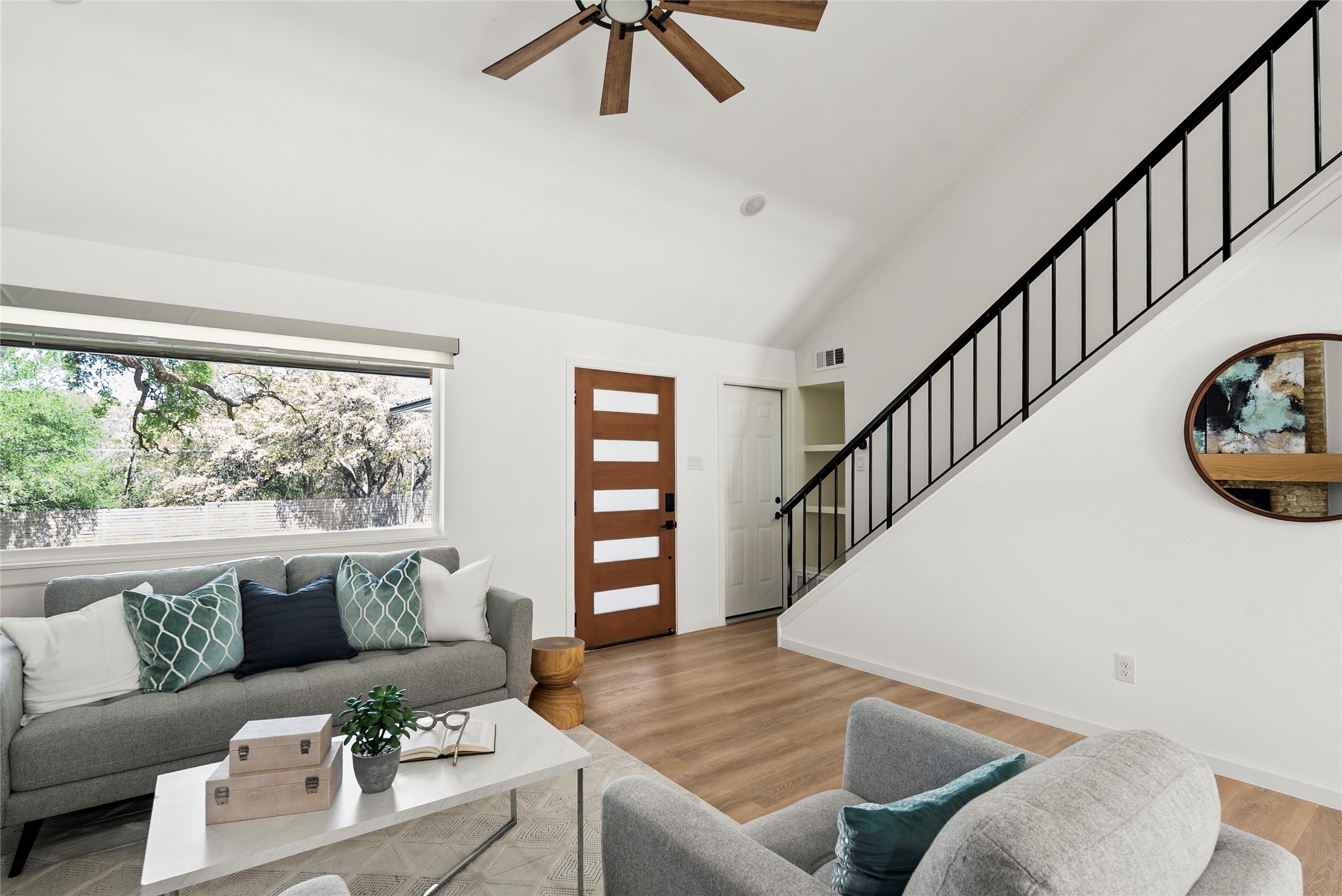 507 West Dittmar Road Austin, TX 78745 - Photo 6 of 40 a living room with furniture and stairs