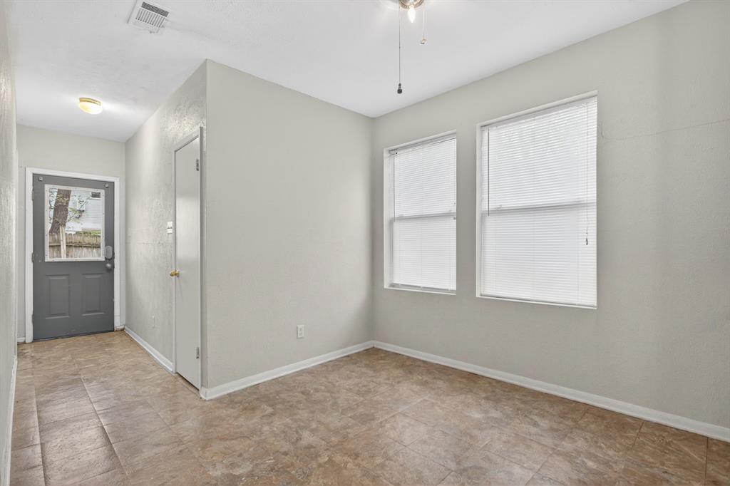 1111 North Austin Street Denton, TX 76201 - Photo 15 of 28 a view of an empty room with a window