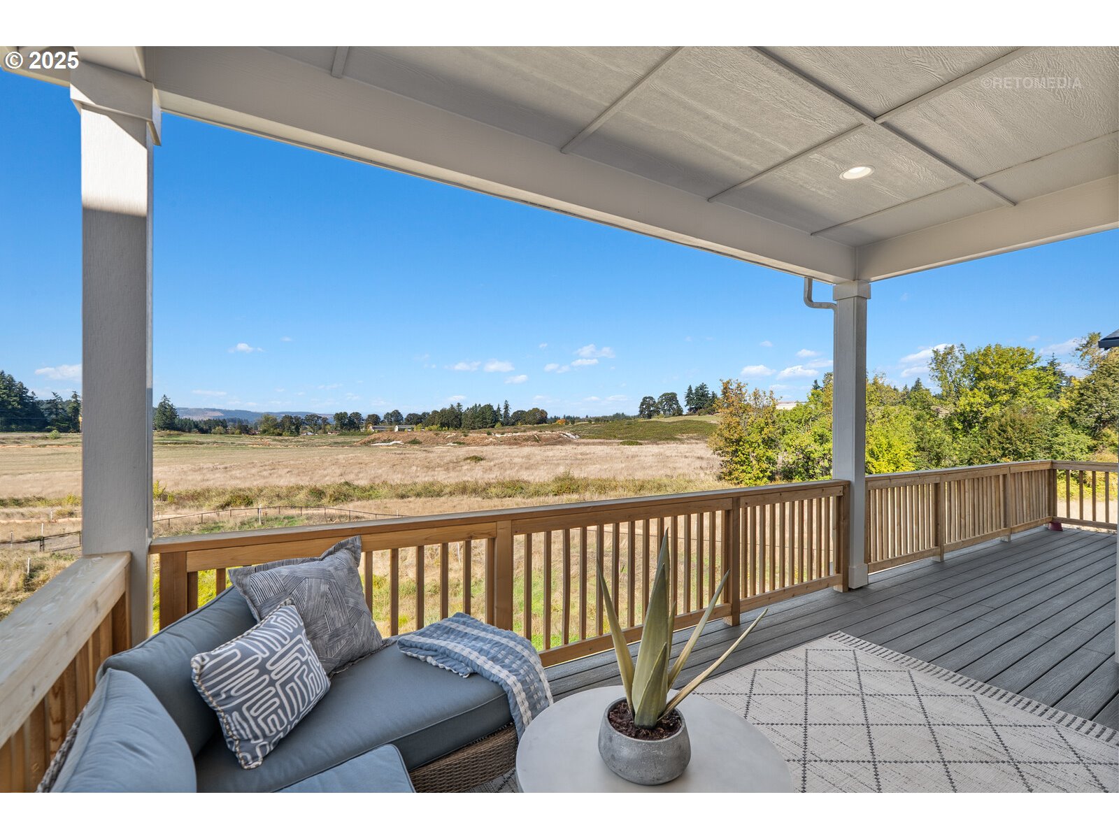 12305 Southwest Silvertip Street Beaverton, OR 97007 - Photo 17 of 43 a view of balcony with couch and outdoor seating