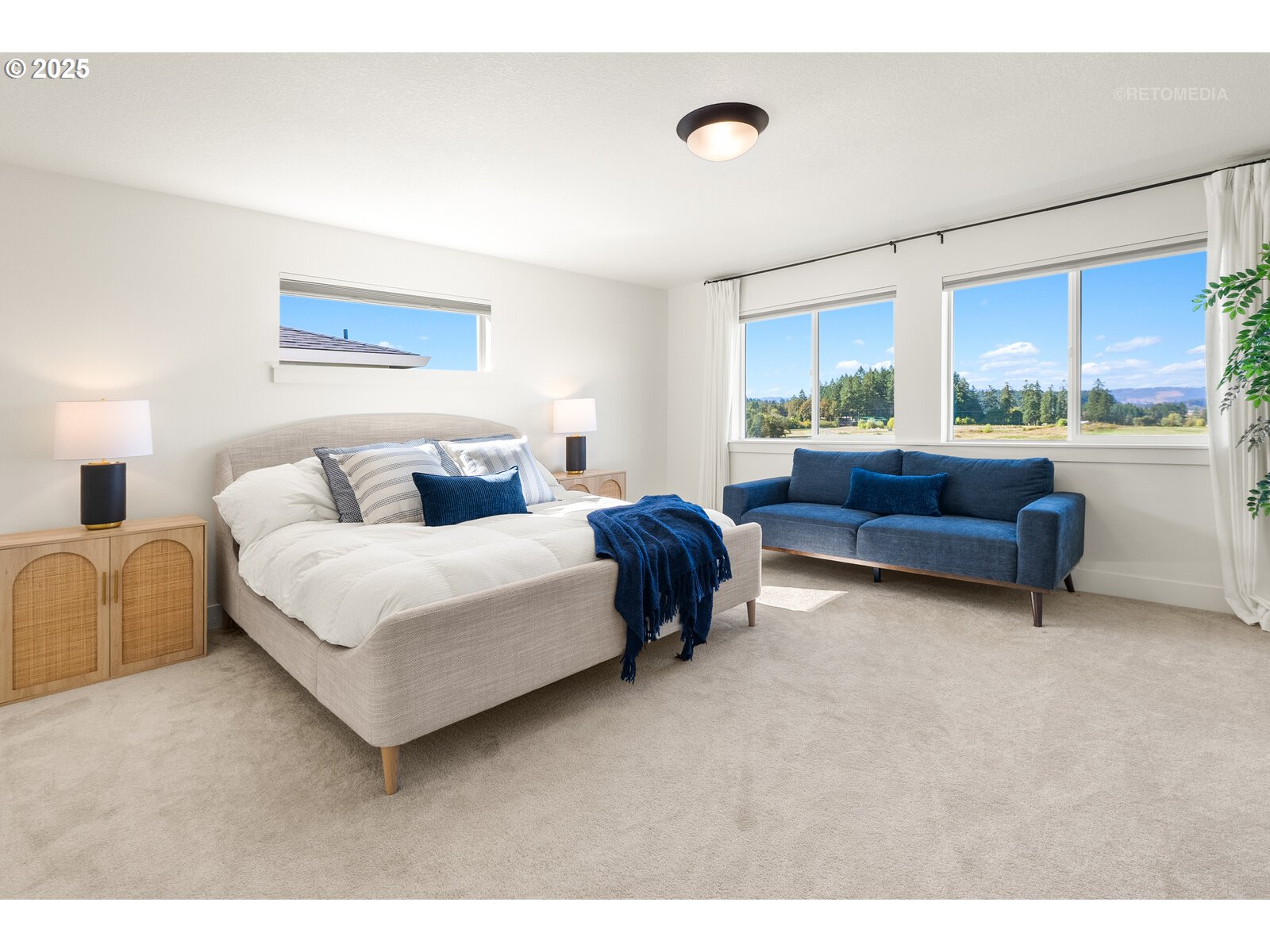 12305 Southwest Silvertip Street Beaverton, OR 97007 - Photo 27 of 43 a bedroom with a bed and a large window