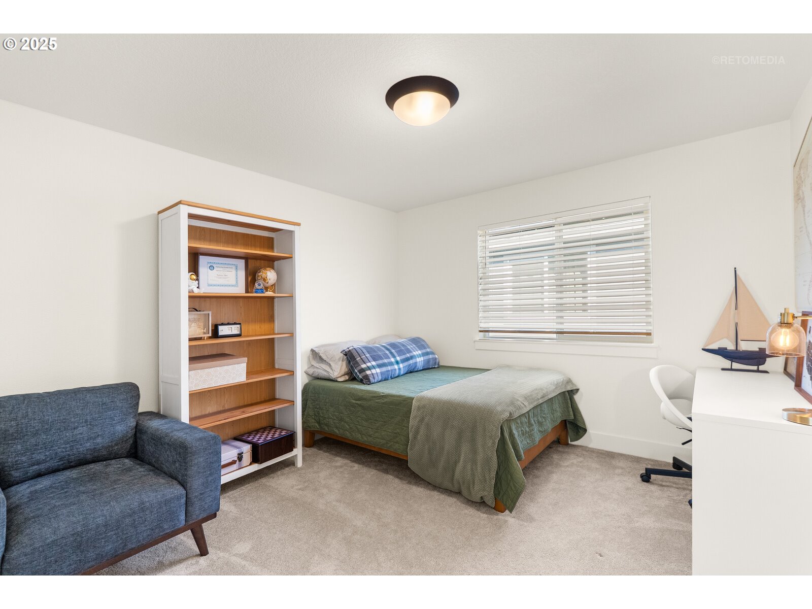 12305 Southwest Silvertip Street Beaverton, OR 97007 - Photo 33 of 43 a bedroom with a bed and a cabinet