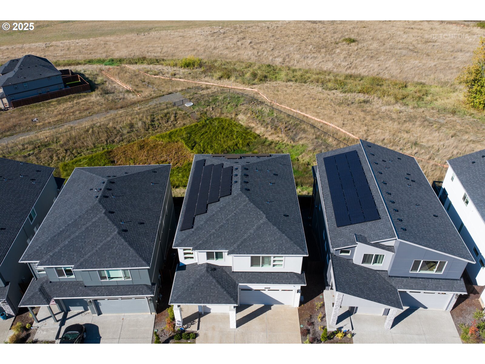 12305 Southwest Silvertip Street Beaverton, OR 97007 - Photo 38 of 43 an aerial view of residential houses with outdoor space