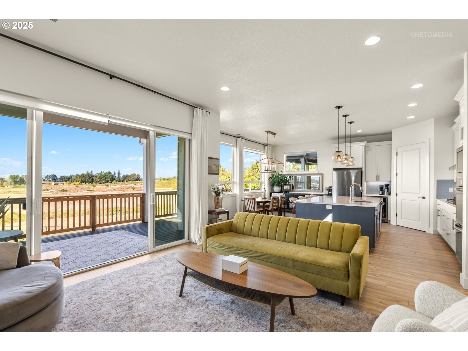 12305 Southwest Silvertip Street Beaverton, OR 97007 - Photo 8 of 43 a living room with furniture and a large window
