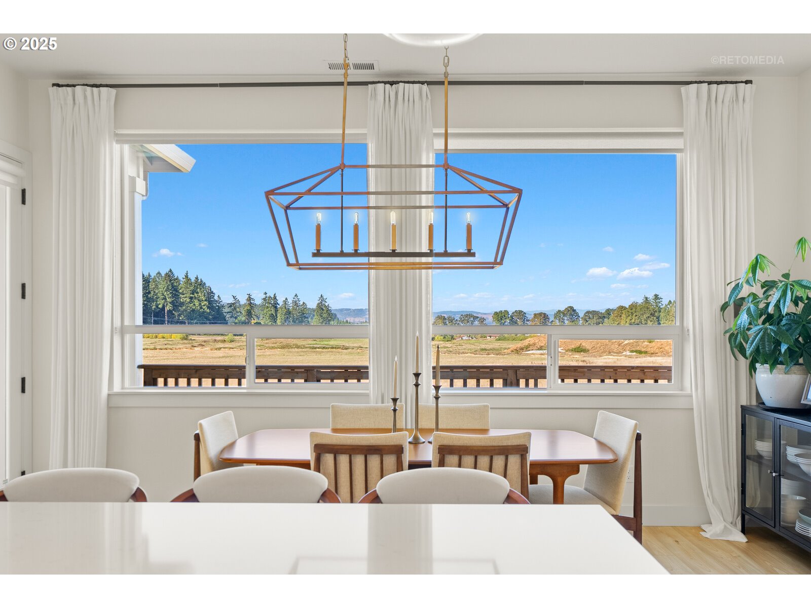 12305 Southwest Silvertip Street Beaverton, OR 97007 - Photo 9 of 43 a view of a living room and kitchen