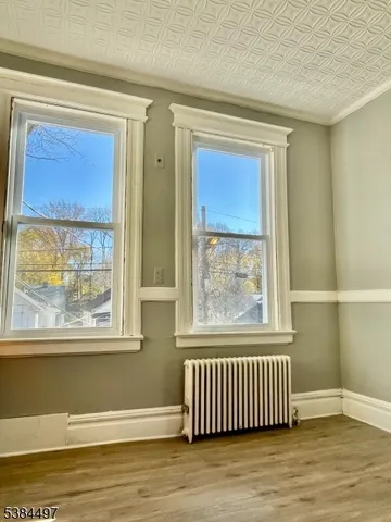 a kitchen with stainless steel appliances a stove a sink and a refrigerator
