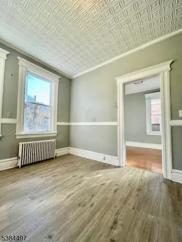 a bathroom with a double vanity sink and a window