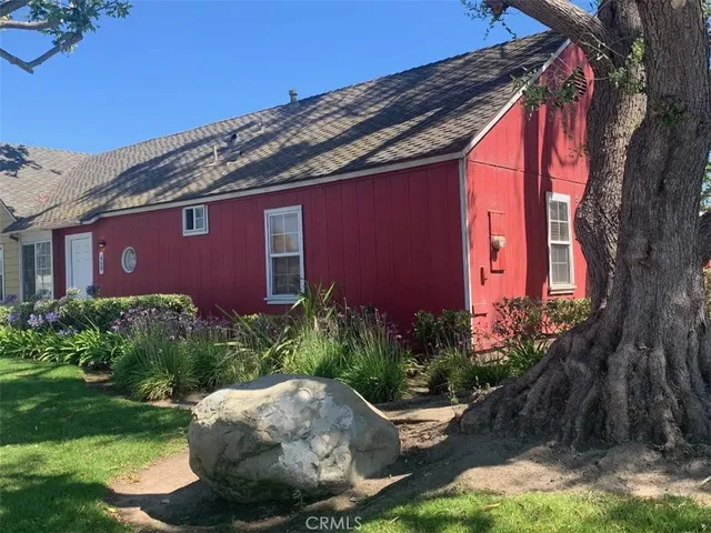 a backyard of a house with lots of green space