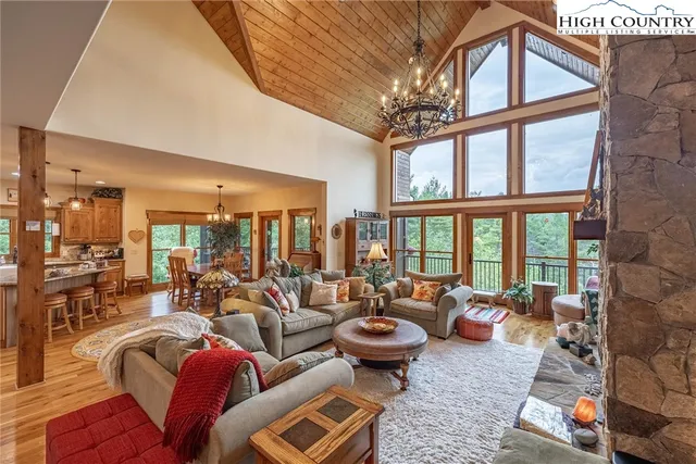 a en suite bathroom with a granite countertop sink and a mirror