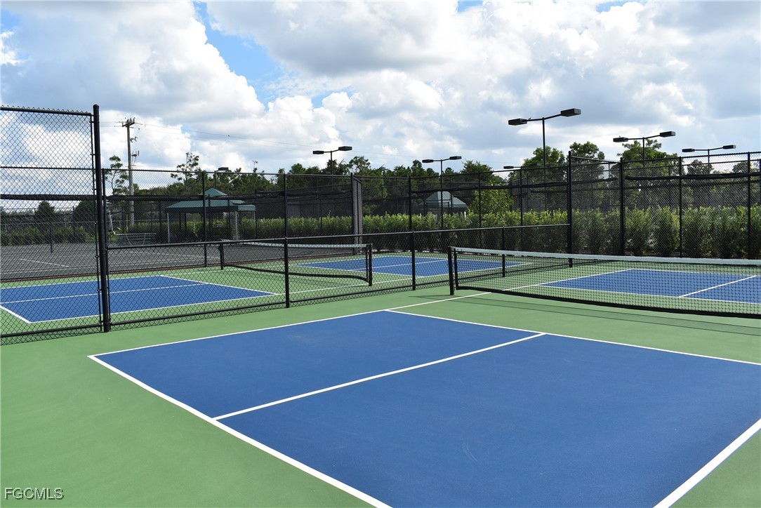 20121 Ian Court, Unit 209 Estero, FL 33928 - Photo 35 of 40 a view of tennis court