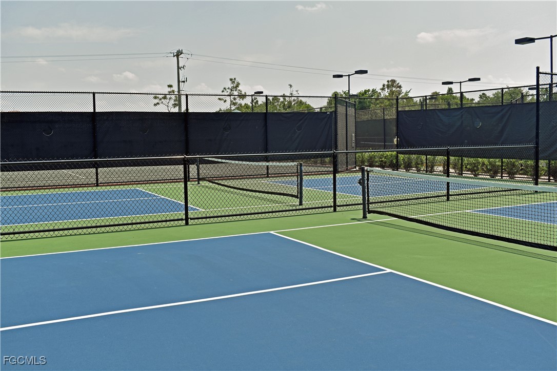 20121 Ian Court, Unit 209 Estero, FL 33928 - Photo 36 of 40 a view of tennis court