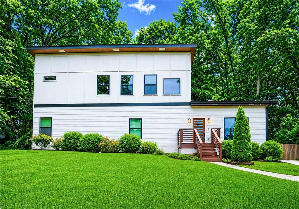 front view of a house with a yard