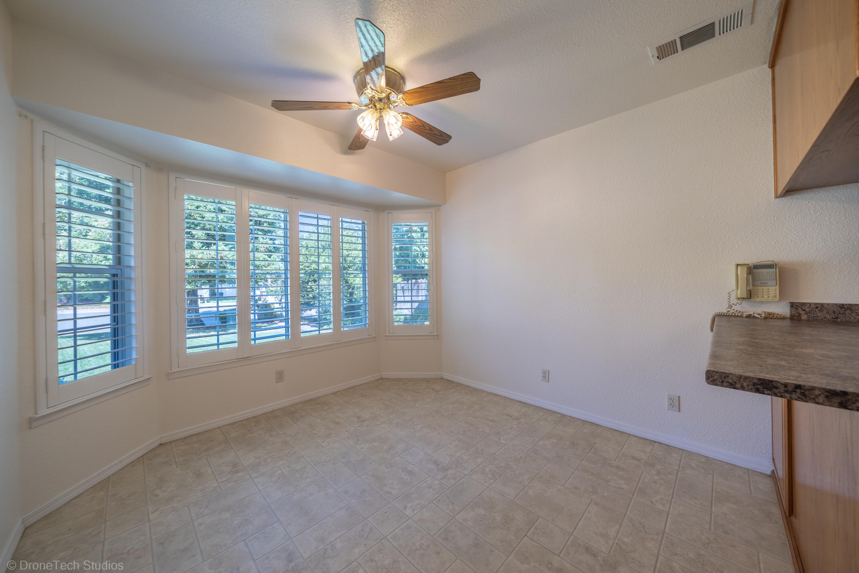 2227 Wicklow Street Redding, CA 96001 - Photo 16 of 90 a view of an empty room with a window