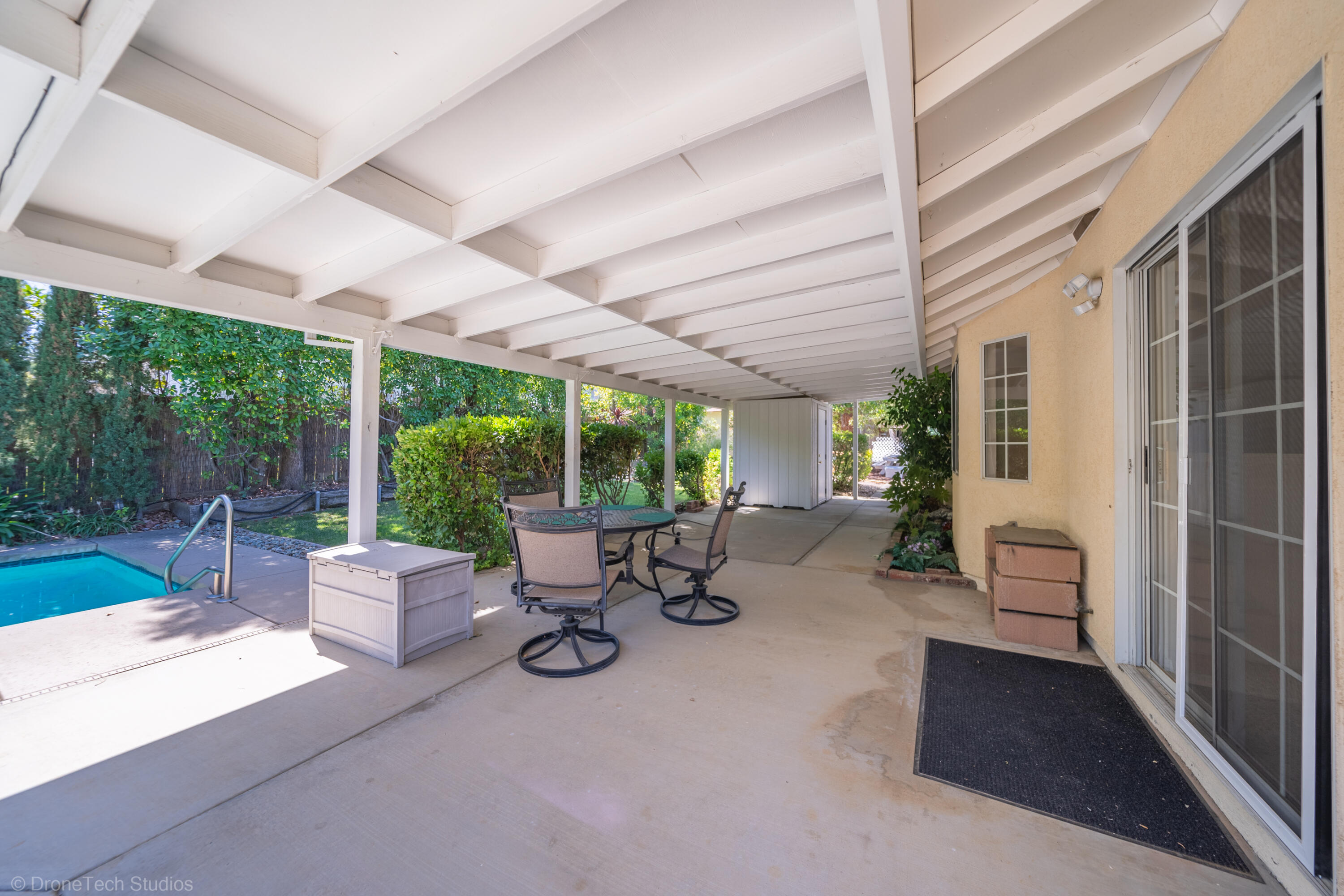 2227 Wicklow Street Redding, CA 96001 - Photo 37 of 90 a building outdoor space with patio furniture and garden