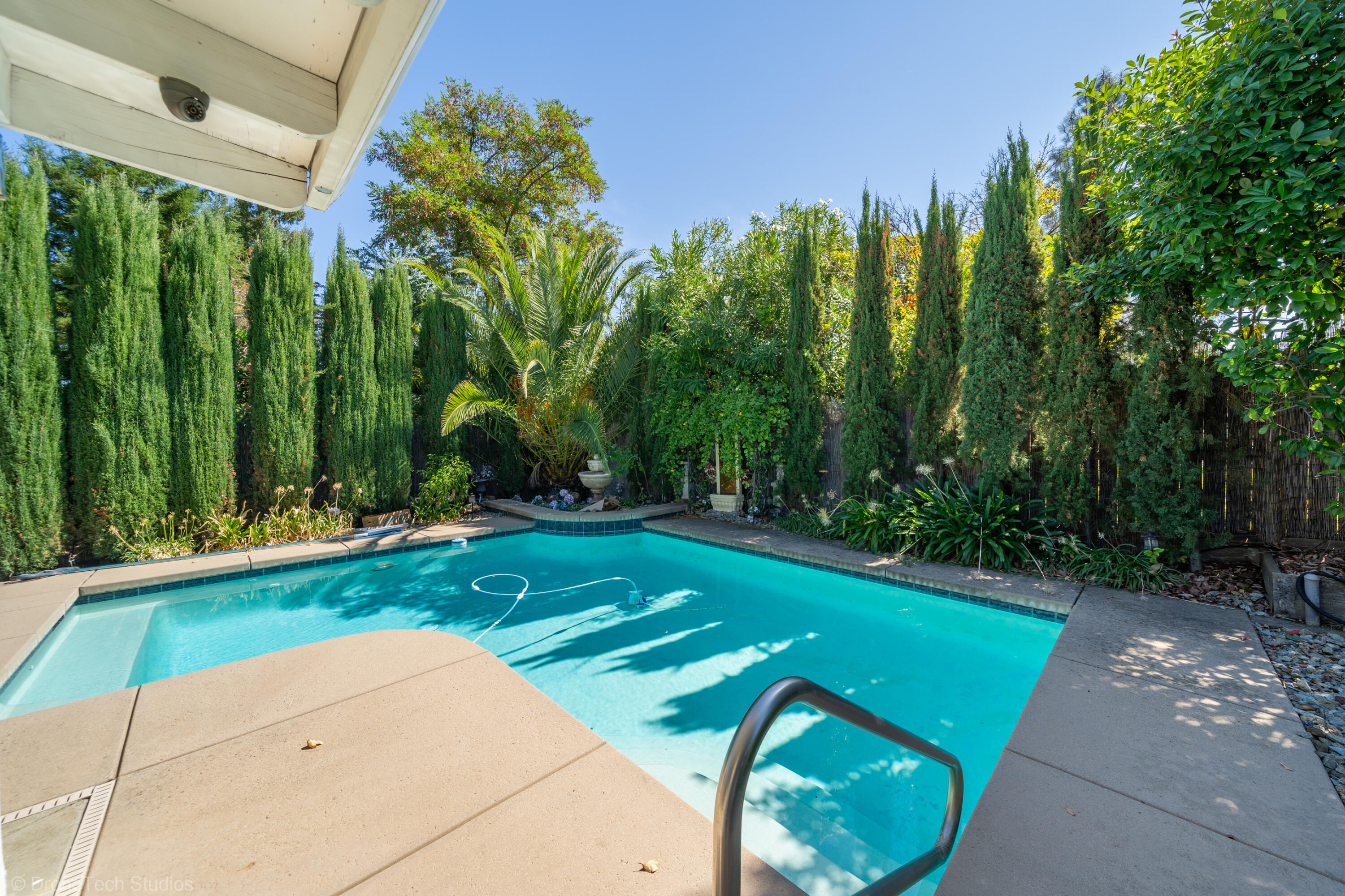 2227 Wicklow Street Redding, CA 96001 - Photo 40 of 90 a view of a backyard with swimming pool