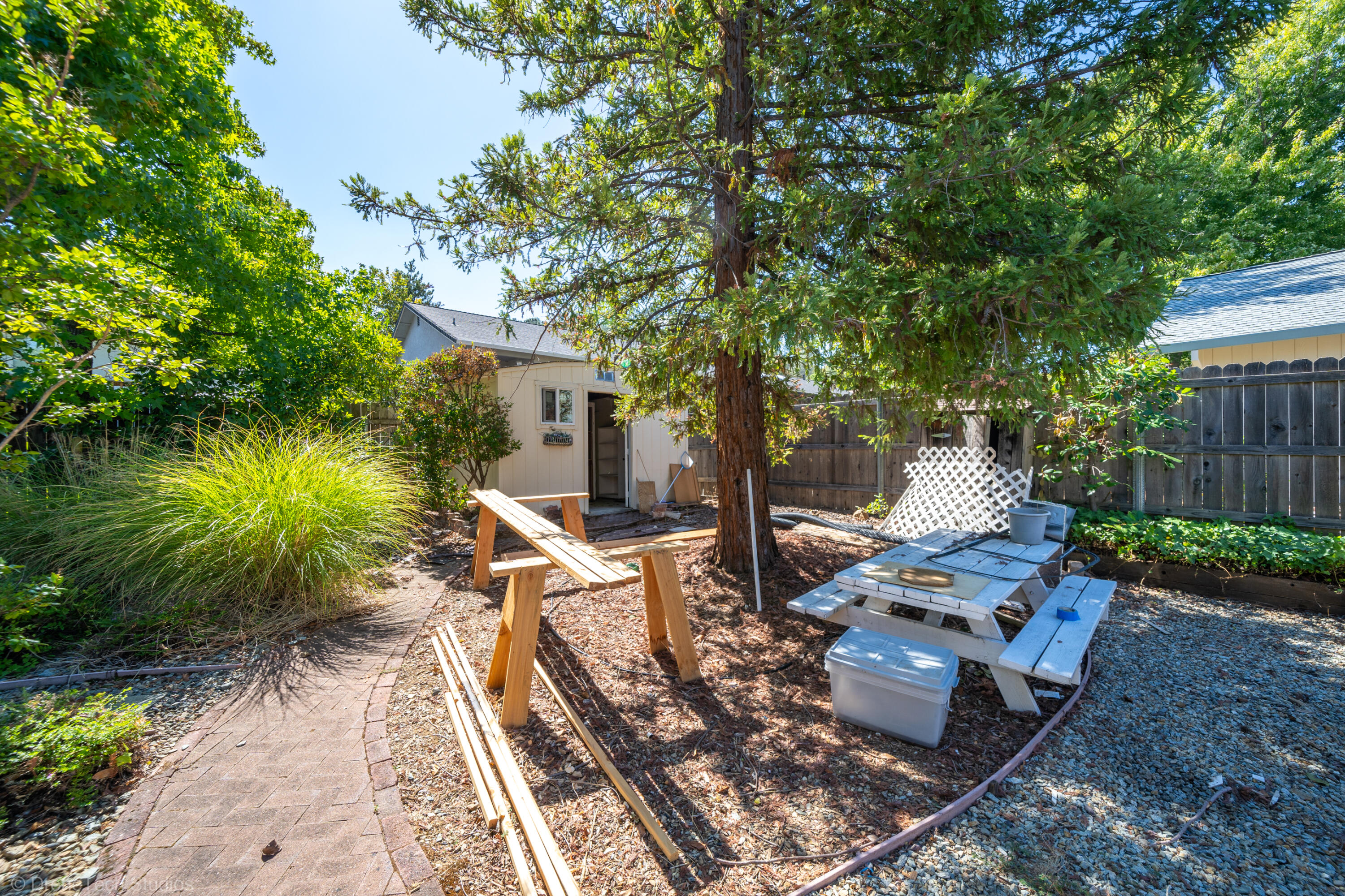 2227 Wicklow Street Redding, CA 96001 - Photo 59 of 90 a view of a backyard with sitting area