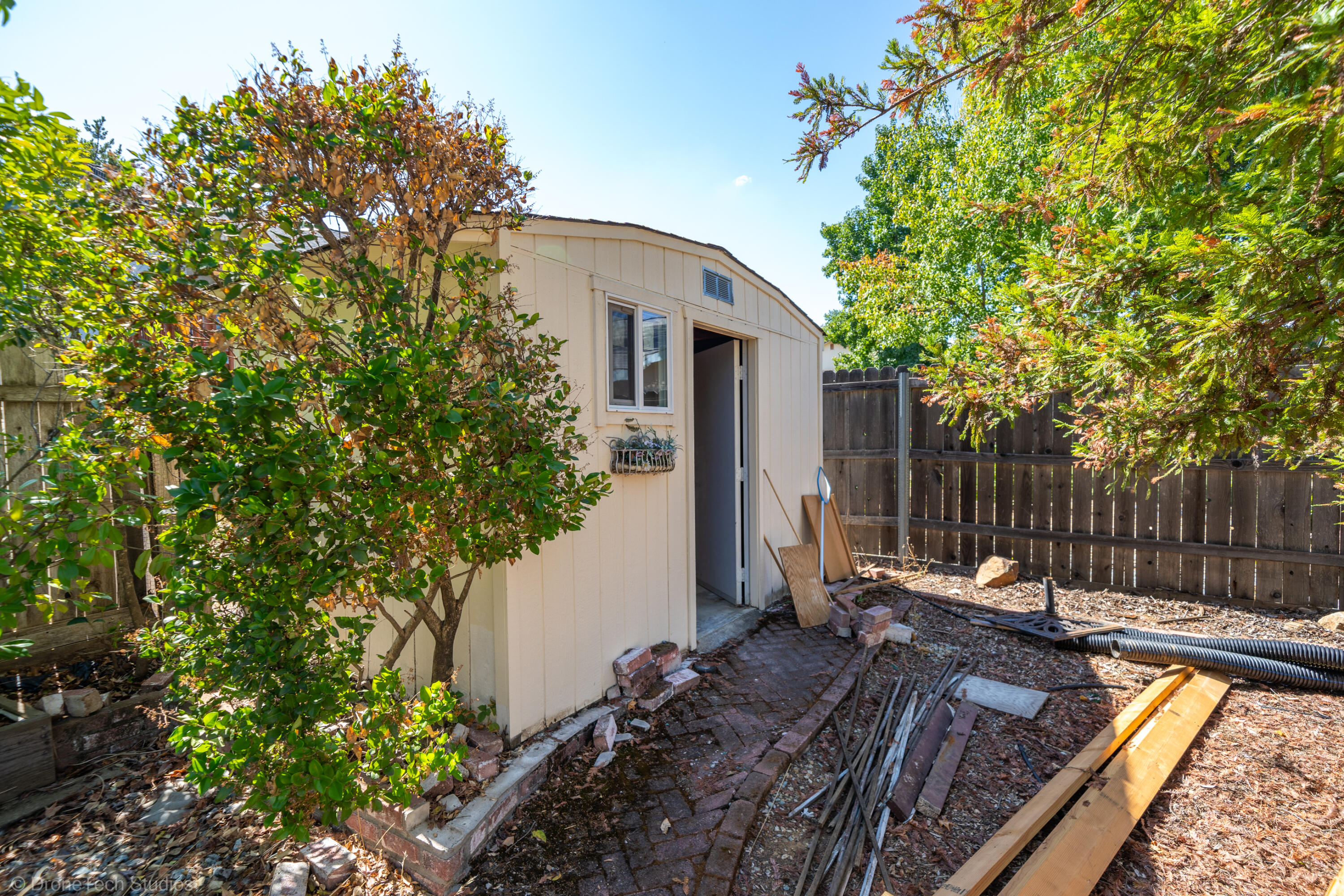 2227 Wicklow Street Redding, CA 96001 - Photo 61 of 90 a view of a house with backyard and sitting area